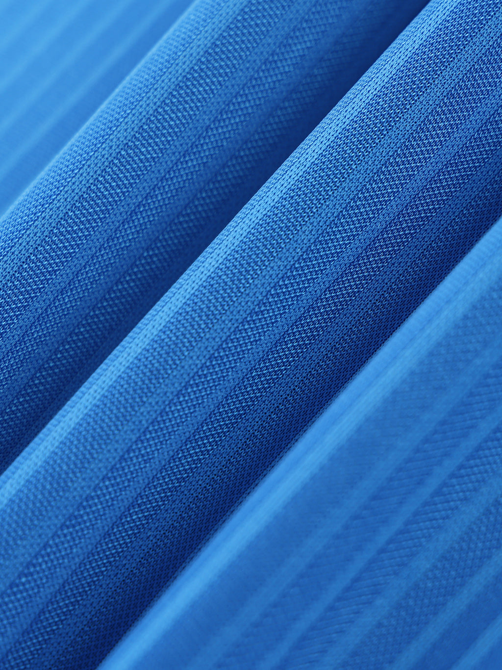 Close-up of blue fabric with a textured pattern